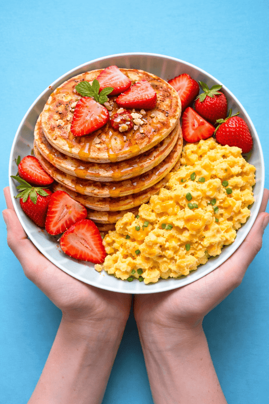 🥞 Protein Pancakes Breakfast with Honey, Strawberries & Cheesy Scrambled Eggs - Nutrum Biotech